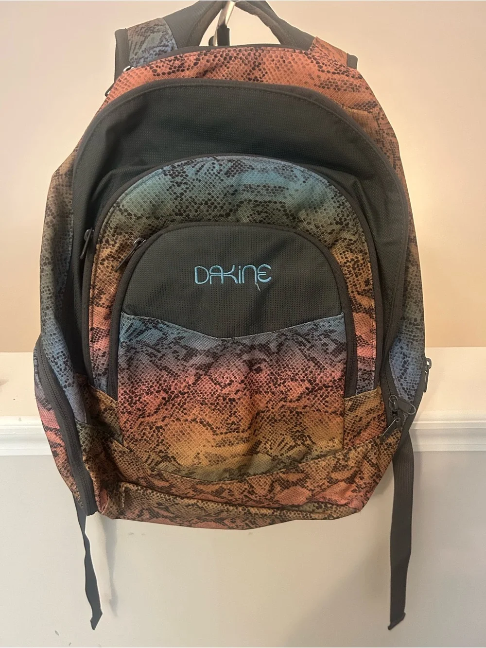 Dakine Rainbow Snake-Print Backpack in Blue, Green, Orange and Pink